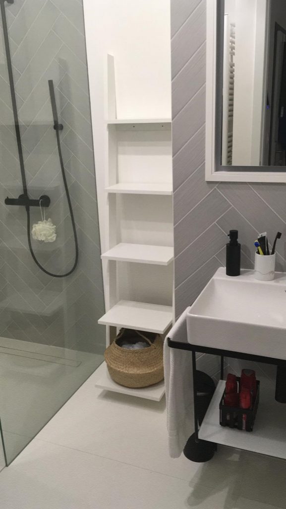 Bathroom with white sink and white box, shower without bath
